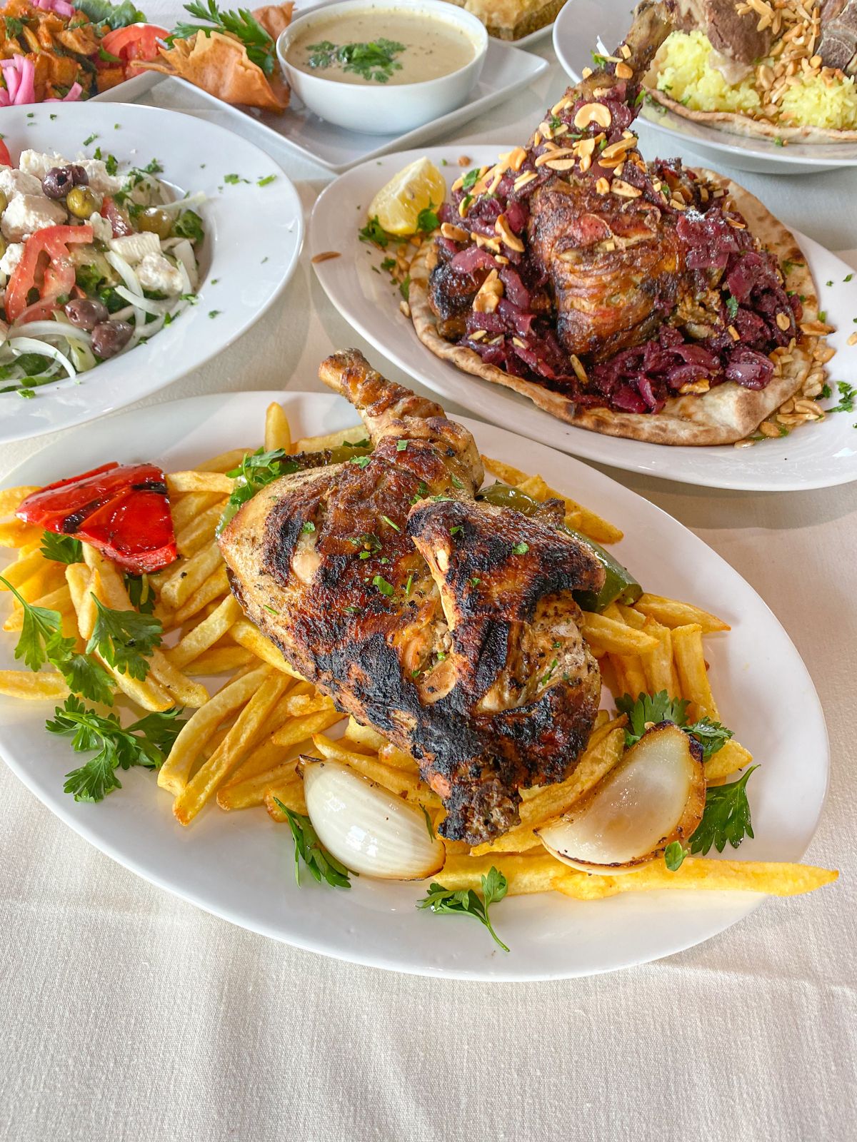 Grilled halal dish served at Layal Cafe in Houston